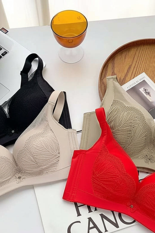 Bradoria embroidered wireless contour bra shown in four colorways — beige, red, green, and black.