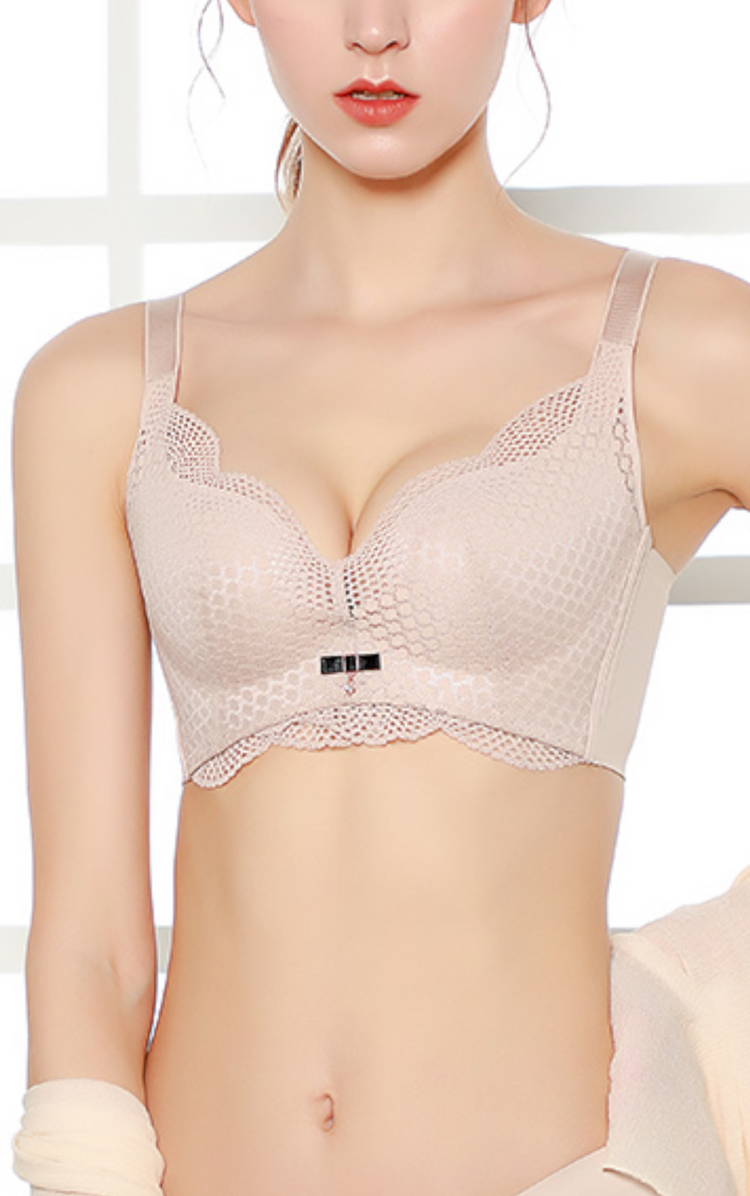 A beige lace push-up bra featuring a scalloped edge design and deep-cut cups to enhance cleavage.