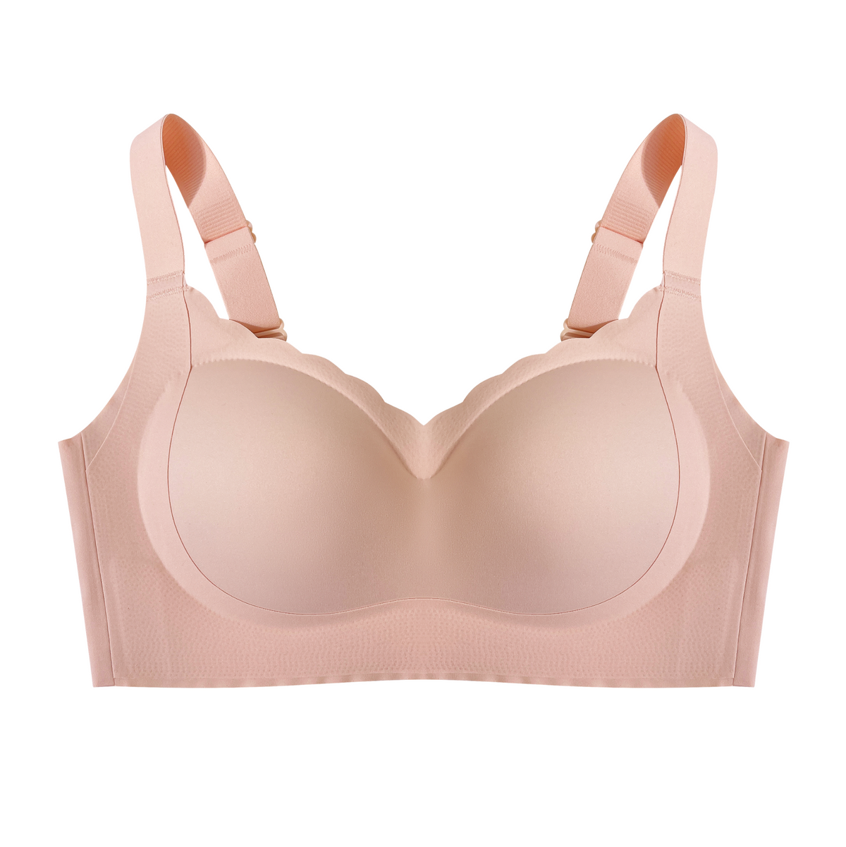  A beige wireless bra on a plain background, highlighting the soft fabric and wide straps.