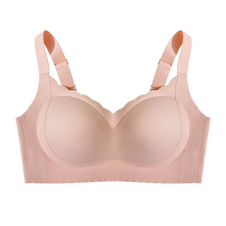  A beige wireless bra on a plain background, highlighting the soft fabric and wide straps.